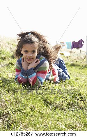 Young Girl Sitting Outside In Caravan Park View Large Photo Image Stock Photo - Young Girl Sitting Outside In Caravan Park. Fotosearch