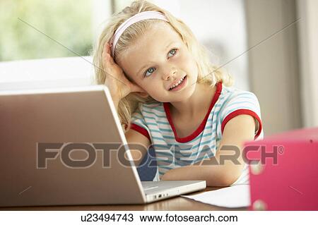 Young Girl Using Laptop At Home View Large Photo Image Stock Image - Young Girl Using Laptop At Home. Fotosearch