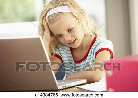 Young Girl Using Laptop At Home View Large Photo Image Stock Photography - Young Girl Using Laptop At Home. Fotosearch