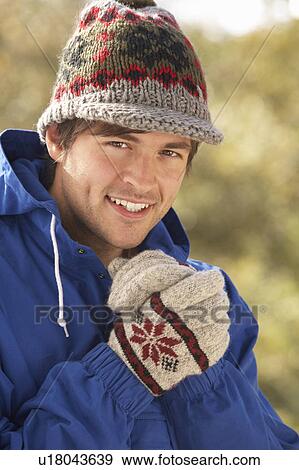 Stock Photo - Young Man Relaxing In Autumn Landscape. Fotosearch