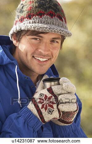 Young Man Relaxing With Thermos Flask In Autumn Landscape View Large Photo Image Stock Photo - Young Man Relaxing With Thermos Flask In Autumn Landscape. Fotosearch