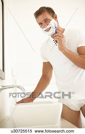 Young Man Shaving In Bathroom Mirror View Large Photo Image Stock Photography - Young Man Shaving In Bathroom Mirror. Fotosearch