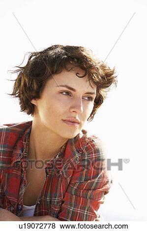 Young Woman Relaxing On Beach View Large Photo Image Stock Photo - Young Woman Relaxing On Beach. Fotosearch