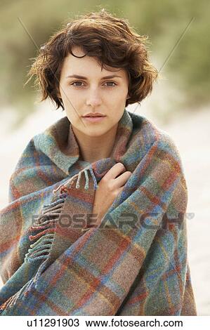 Young Woman Standing In Sand Dunes Wrapped In Blanket View Large Photo Image Stock Image - Young Woman Standing In Sand Dunes Wrapped In Blanket. Fotosearch
