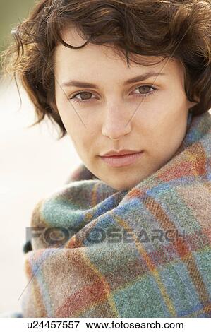 Young Woman Standing In Sand Dunes Wrapped In Blanket View Large Photo Image Stock Photo - Young Woman Standing In Sand Dunes Wrapped In Blanket. Fotosearch