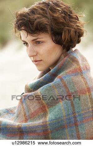 Young Woman Standing In Sand Dunes Wrapped In Blanket View Large Photo Image Stock Photography - Young Woman Standing In Sand Dunes Wrapped In Blanket. Fotosearch