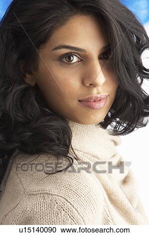 Young Woman Wearing Warm Winter Clothes And Fur Hat In Studio View Large Photo Image Stock Image - Young Woman Wearing Warm Winter Clothes And Fur Hat In Studio. Fotosearch