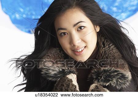 Young Woman Wearing Warm Winter Clothes In Studio View Large Photo Image Stock Image - Young Woman Wearing Warm Winter Clothes In Studio. Fotosearch