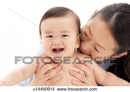 Picture - Baby Boy and Mother. Fotosearch