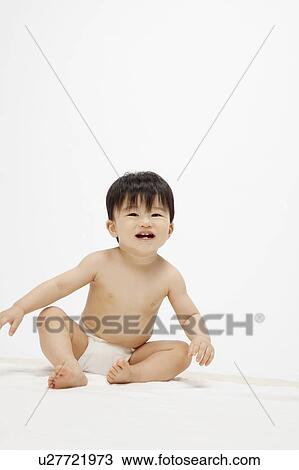 Baby boy sitting View Large Photo Image Stock Image - Baby boy sitting. Fotosearch