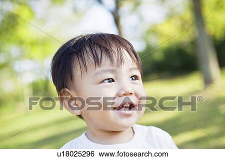 Stock Photograph - Baby boy smiling. Fotosearch