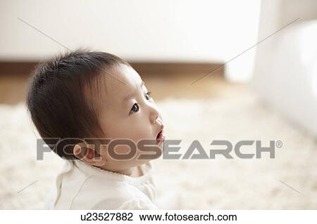 Stock Image - Baby Boy Staring. Fotosearch