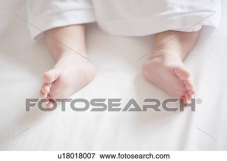 Stock Photo - Baby's foot. Fotosearch