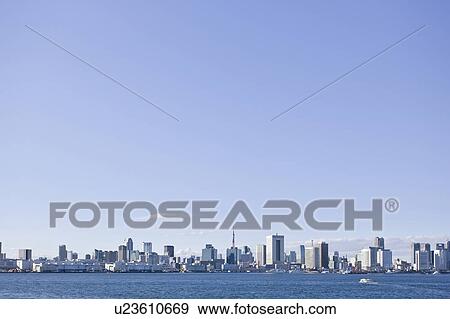 Stock Photo - Blue Sky Over Tokyo Skyline. Fotosearch