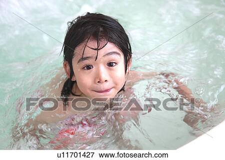 Boy in a Jacuzzi View Large Photo Image Stock Photo - Boy in a Jacuzzi. Fotosearch