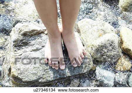 Boy Standing Barefoot on Stone View Large Photo Image Picture - Boy Standing Barefoot on Stone. Fotosearch