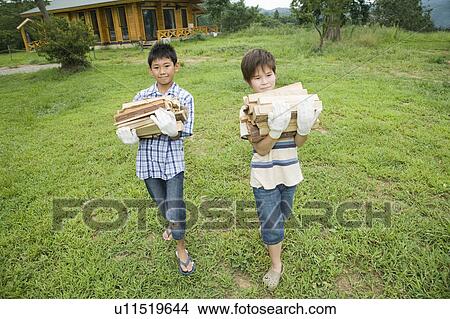 Boys carrying firewood, Chiba Prefecture, Honshu, Japan View Large Photo Image Picture - Boys carrying firewood, Chiba Prefecture, Honshu, Japan. Fotosearch