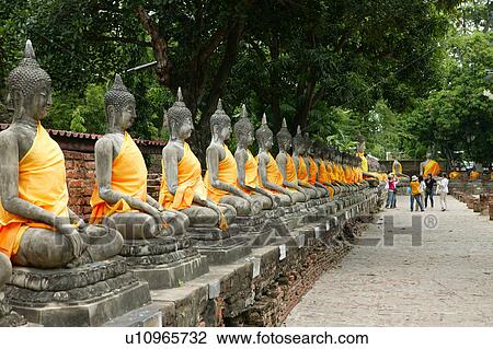 Stock Image - Buddha Statues at Wat Yai Chaya Mongkol. Fotosearch
