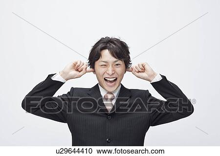 Businessman covering his ears View Large Photo Image Stock Image - Businessman covering his ears . Fotosearch
