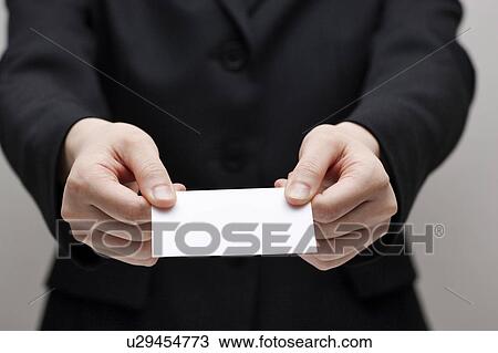 Businessman giving business card View Large Photo Image Stock Image - Businessman giving business card. Fotosearch
