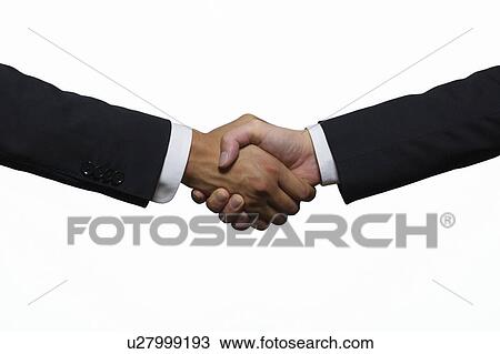 Stock Image - Businessmen shaking hands. Fotosearch