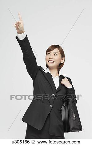 Businesswoman pointing View Large Photo Image Stock Image - Businesswoman pointing. Fotosearch