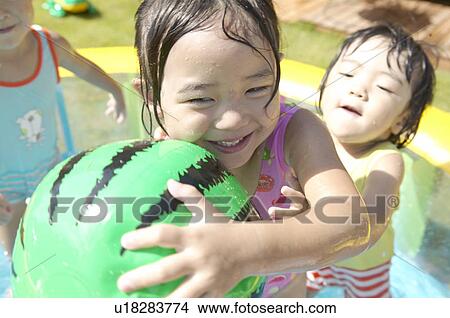 Picture - Children Playing in Pool. Fotosearch