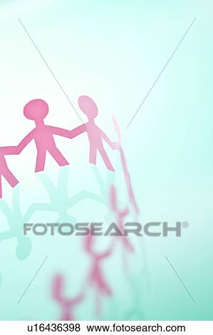Close-up of paper cut-out figures View Large Photo Image Stock Photo - Close-up of paper cut-out figures. Fotosearch