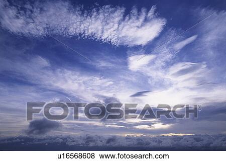 Stock Photo - Clouds in Sky. Fotosearch