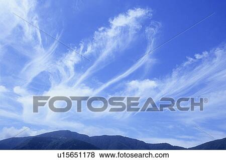 Stock Photo - Clouds Over Mountain Range. Fotosearch