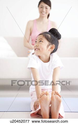 Stock Photo - Daughter Sitting on Floor. Fotosearch