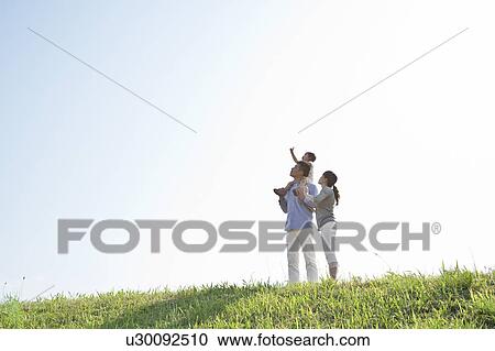 Father carrying daughter on shoulder looking up View Large Photo Image Stock Image - Father carrying daughter on shoulder looking up. Fotosearch