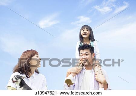 Father carrying daughter on shoulders View Large Photo Image Stock Image - Father carrying daughter on shoulders. Fotosearch