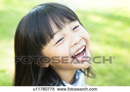 Stock Photography - Girl laughing. Fotosearch