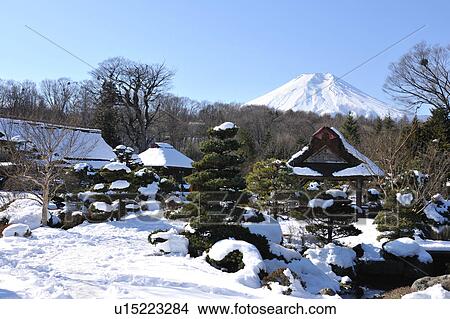 Picture - House and Mt. Fuji, Oshino Village, Yamanashi Prefecture, Honshu, Japan. Fotosearch