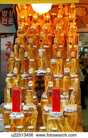 Stock Photograph - Jars of Ginseng and Panax Schinseng. Fotosearch