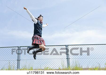 Junior High School Student Jumping of Joy View Large Photo Image Stock Image - Junior High School Student Jumping of Joy. Fotosearch