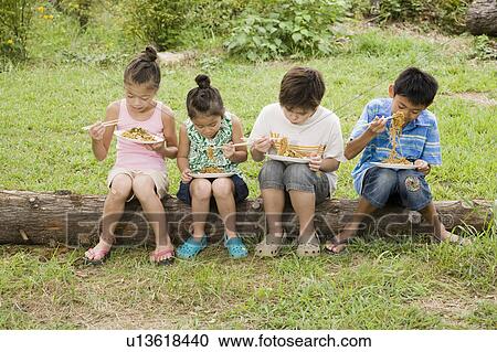 Kids eating Yakisoba (Fried Noodles), Chiba Prefecture, Honshu, Japan View Large Photo Image Stock Image - Kids eating Yakisoba (Fried Noodles), Chiba Prefecture, Honshu, Japan. Fotosearch