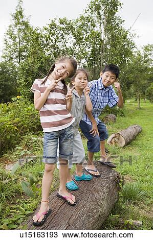 Kids looking at camera, Chiba Prefecture, Honshu, Japan View Large Photo Image Stock Image - Kids looking at camera, Chiba Prefecture, Honshu, Japan. Fotosearch