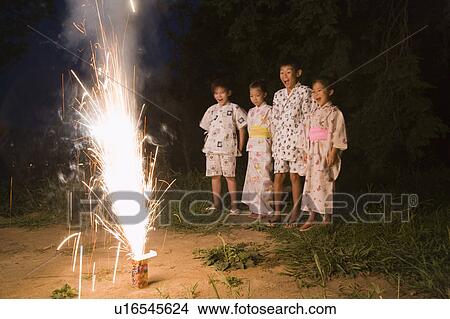 Kids playing with firework, Chiba Prefecture, Honshu, Japan View Large Photo Image Picture - Kids playing with firework, Chiba Prefecture, Honshu, Japan. Fotosearch