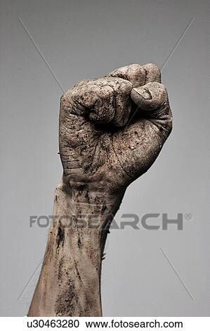 Stock Image - Man making a fist. Fotosearch