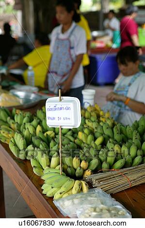 Stock Image - Market Stall Selling Bananas. Fotosearch