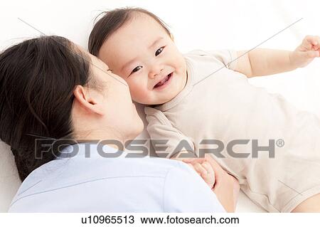 Mother Kissing Baby Boy View Large Photo Image Stock Image - Mother Kissing Baby Boy. Fotosearch