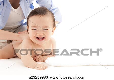 Mother Rubbing Baby Boy's Back View Large Photo Image Stock Photograph - Mother Rubbing Baby Boy's Back. Fotosearch