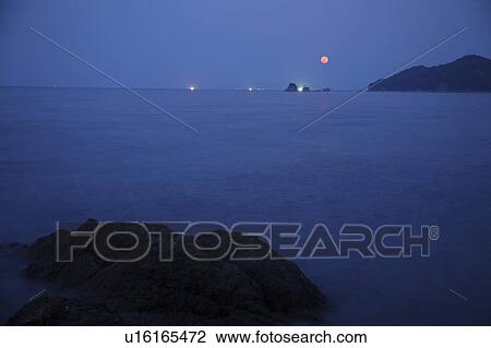Stock Image - Ocean and moon. Fotosearch