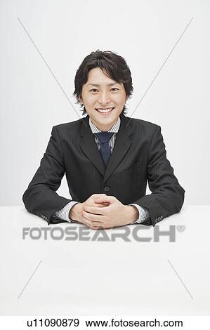 Stock Photo - Portrait of businessman. Fotosearch