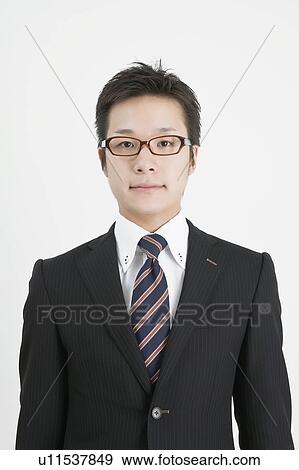 Stock Photo - Portrait of young businessman . Fotosearch