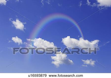 Stock Photo - Rainbow in the sky, Digital composite. Fotosearch