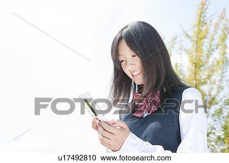 Schoolgirl Text Messaging View Large Photo Image Stock Image - Schoolgirl Text Messaging. Fotosearch