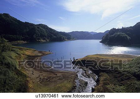 Stock Image - Shusen Lake and Mountain Range. Fotosearch